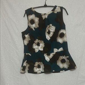 Blue Peplum Sleeveless Blouse with Floral Design